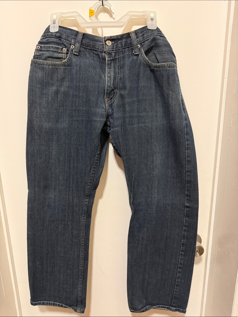 Levi's Slim Straight Jeans in Dark Blue with Leather Patch
